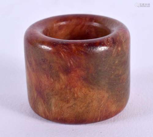 A CHINESE CARVED HORN AGATE ARCHERS RING 20th Century. 2.25 ...