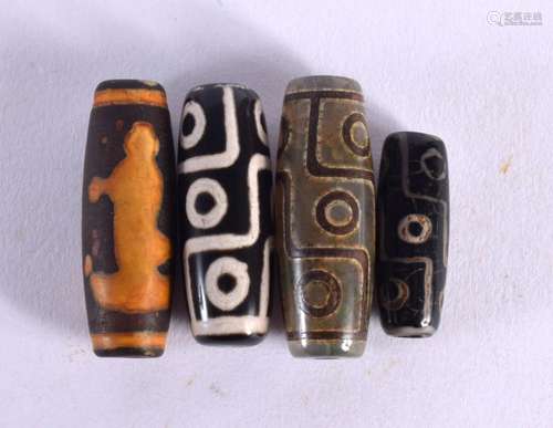 FOUR CHINESE TIBETAN AGATE BEADS 20th Century. (4)