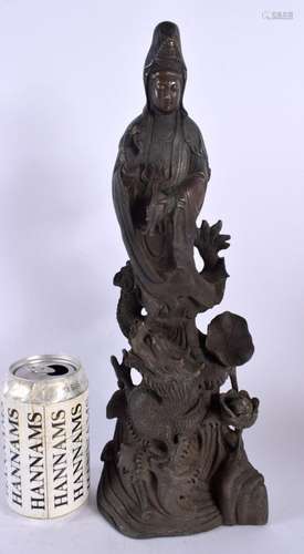 A CHINESE BRONZE FIGURE OF A BUDDHISTIC DEITY 20th Century. ...