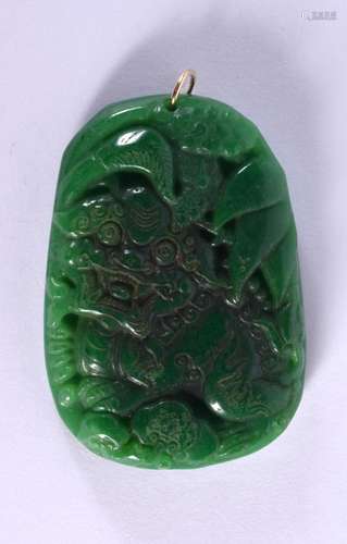 A CHINESE CARVED GREEN JADE GOLD MOUNTED PENDANT 20th Centur...