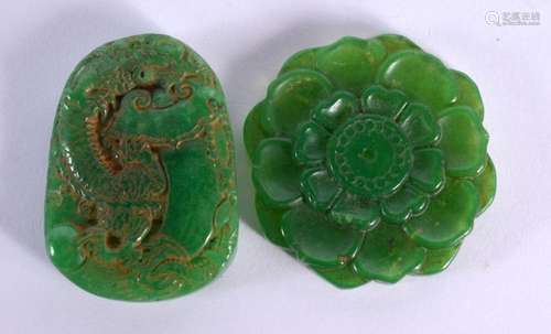 TWO CHINESE CARVED JADE PENDANTS 20th Century. Largest 5 cm ...