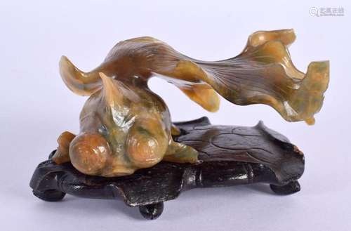 A CHINESE REPUBLICAN PERIOD CARVED SOAPSTONE FISH. 8.5 cm x ...