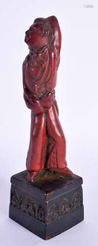 AN UNUSUAL EARLY 20TH CENTURY CHINESE RED LACQUER FIGURE OF ...