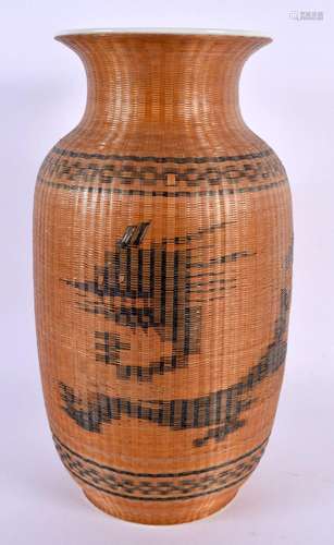 A CHINESE REPUBLICAN PERIOD WICKER OVERLAID PORCELAIN VASE. ...