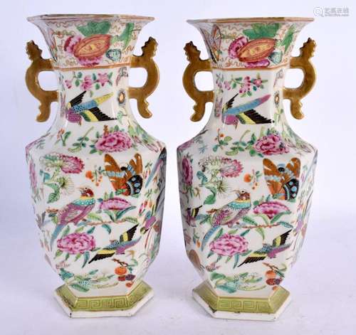 A PAIR OF 19TH CENTURY CHINESE TWIN HANDLED FAMILLE ROSE VAS...