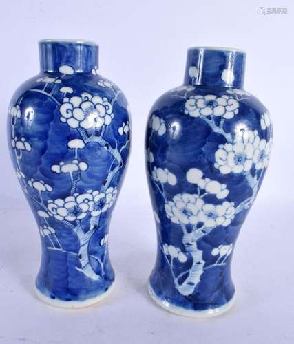 A PAIR OF 19TH CENTURY CHINESE BLUE AND WHITE VASES bearing ...