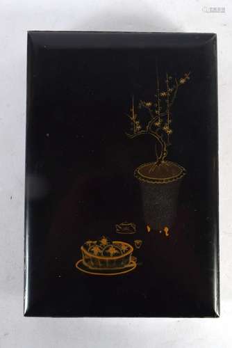 AN EARLY 20TH CENTURY JAPANESE MEIJI PERIOD BLACK LACQUER BO...