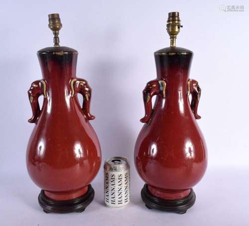 A PAIR OF EARLY 20TH CENTURY CHINESE TWIN HANDLED FLAMBE LAM...