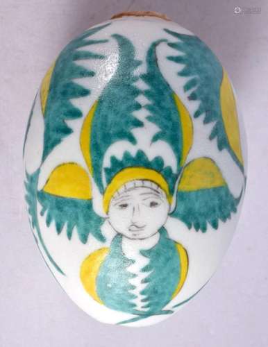 A TURKISH OTTOMAN ARMENIAN EGG painted with figures. 9 cm x ...