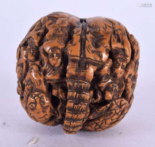 A LATE 19TH CENTURY CHINESE CARVED NUT. 4 cm wide.