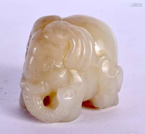 AN EARLY 20TH CENTURY CHINESE CARVED WHITE JADE ELEPHANT Lat...