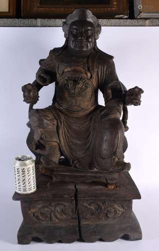 A VERY LARGE 18TH CENTURY CHINESE CARVED WOOD FIGURE OF A GU...