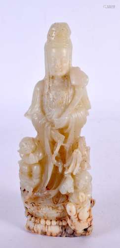 A CHINESE CARVED GREEN JADE FIGURE OF A STANDING DEITY 20th ...