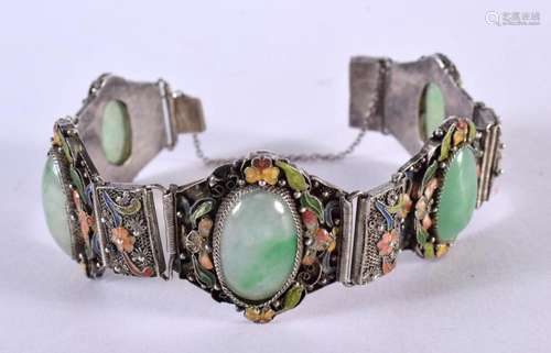 AN EARLY 20TH CENTURY CHINESE SILVER JADEITE AND ENAMEL BRAC...