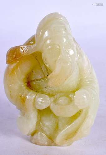 A CHINESE CARVED GREEN JADE FIGURE OF A SCHOLAR 20th Century...