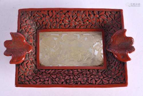 AN EARLY 20TH CENTURY CHINESE CINNABAR LACQUER OVERLAID JADE...