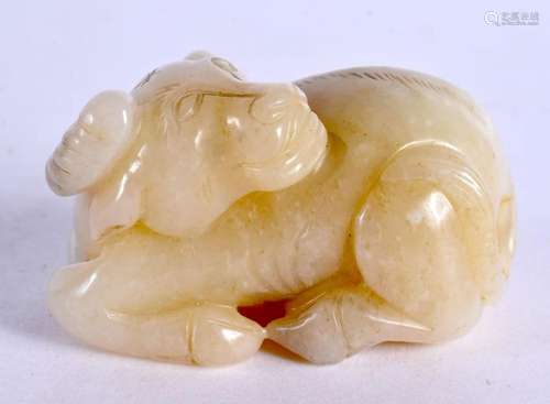 A CHINESE CARVED JADE BULL 20th Century. 6 cm x 3 cm.