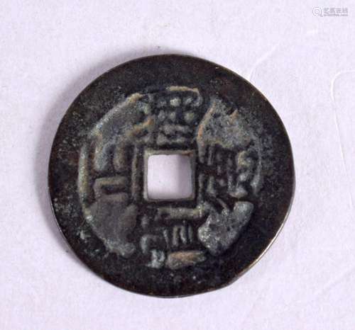 A CHINESE COIN. 20th Century. 3 cm diameter.