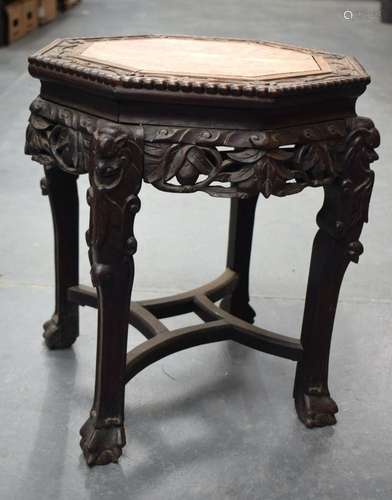 A 19TH CENTURY CHINESE CARVED HARDWOOD MARBLE INSET STAND Qi...