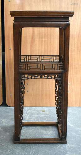 AN EARLY 20TH CENTURY CHINESE CARVED HARDWOOD STAND. 85 cm x...