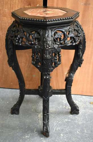 A 19TH CENTURY CHINESE CARVED HARDWOOD MARBLE INSET STAND. 4...