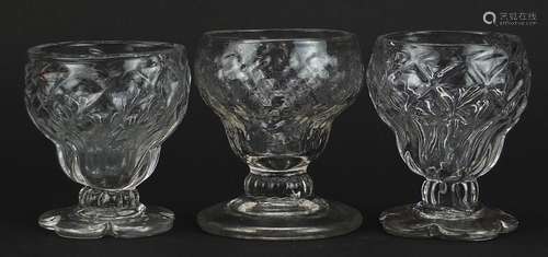 Three antique bonnet glasses, the largest 7.5cm high