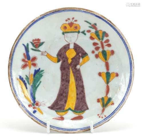 Turkish Kutahya pottery dish hand painted with a figure, 15c...