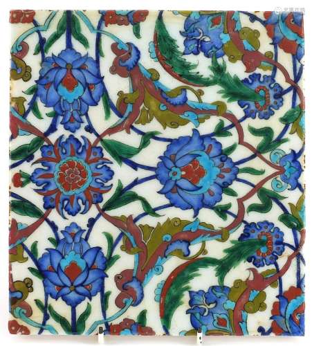 Turkish Iznik pottery tile hand painted with leaves and flow...
