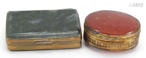 Two brass pill boxes including one with moss agate, the larg...