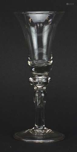 18th century wine glass with bell shaped bowl on folded foot...