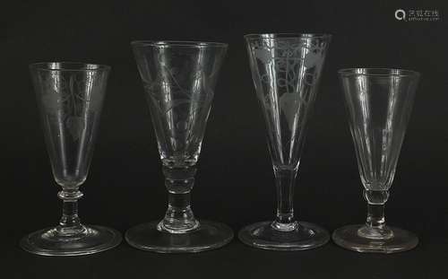 Four 18th century ale glasses including three etched with fl...