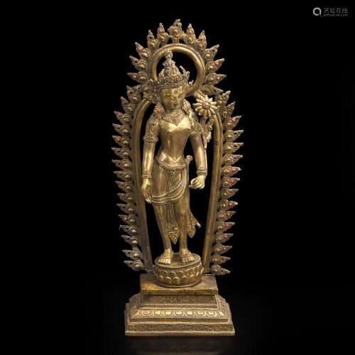 A Sino-Tibetan or Nepalese gilt bronze figure of Padmapani 藏...