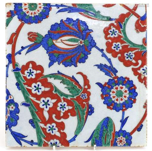 Turkish Iznik pottery tile hand painted with leaves and flow...