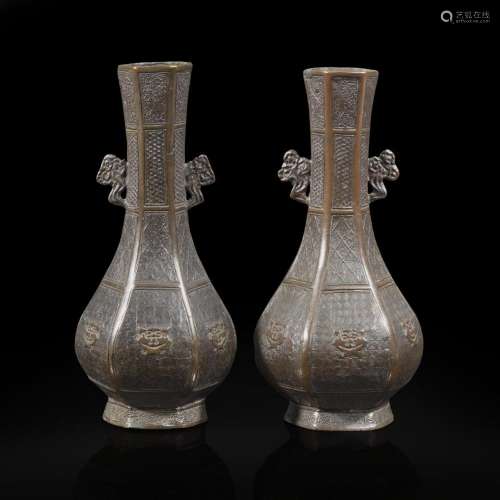 A pair of Chinese patinated bronze hexagonal bottle vases 铜...