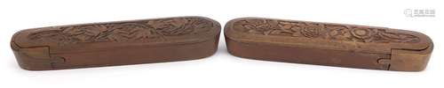 Pair of Islamic wooden pen boxes carved with leaves and flow...