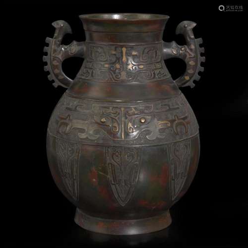 A large archaistic inlaid and patinated bronze "Hu"...