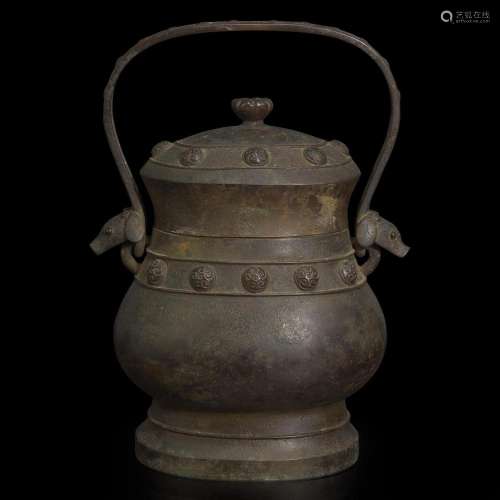 A Chinese patinated bronze archaistic vessel and cover, you ...