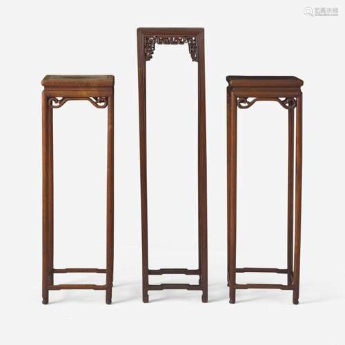 Three Chinese hardwood tall stands 香几三件 Late Qing to Rep...