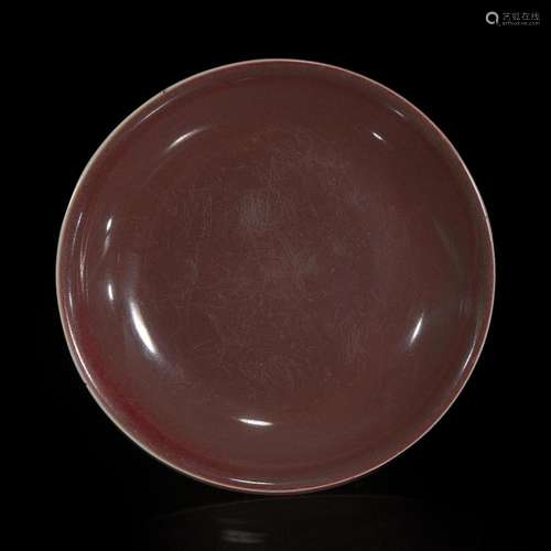 A Chinese copper-red glazed dish 釉里红碟子 Xuande incised s...