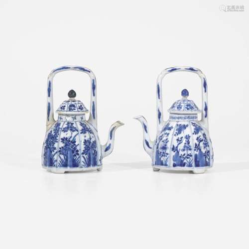 An associated pair of Chinese blue and white porcelain teapo...