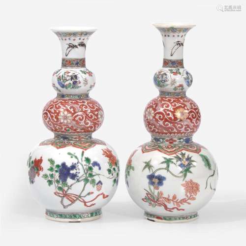 A pair of Chinese famille verte-decorated porcelain triple-g...