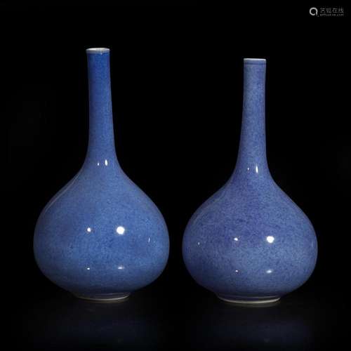 A pair of Chinese powder blue-glazed bottle vases 洒蓝地赏瓶...