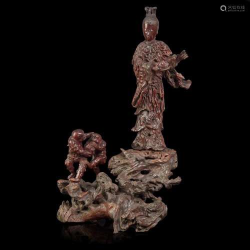 A large Chinese carved rootwood figural group depicting a me...