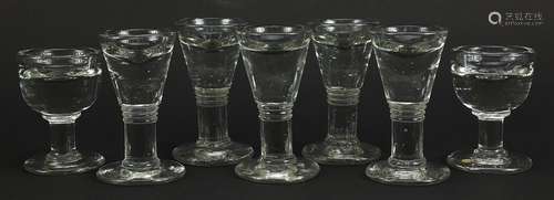 Eight 18th/19th century penny lick illusion glasses, the lar...