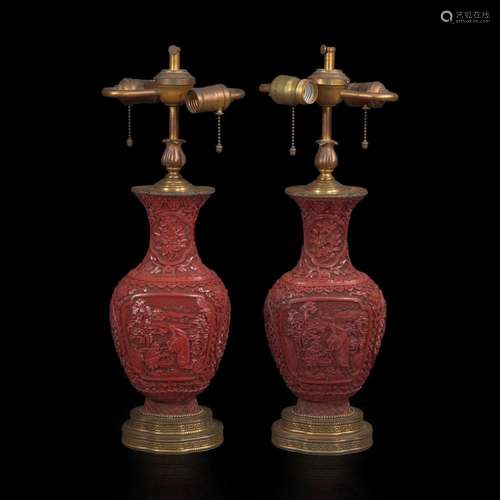 A pair of Chinese carved cinnabar lacquer vases 朱漆花樽一对...