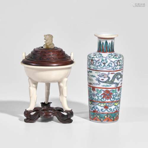 A Chinese Dehua porcelain small tripod censer and a small do...