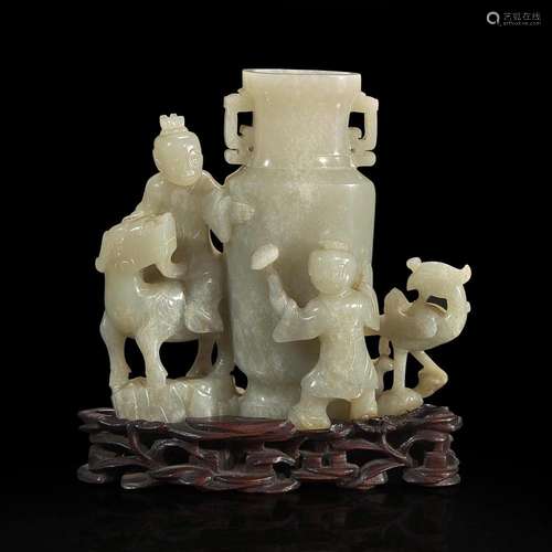 A Chinese jade "Boys, Kylin and Phoenix" vase on c...