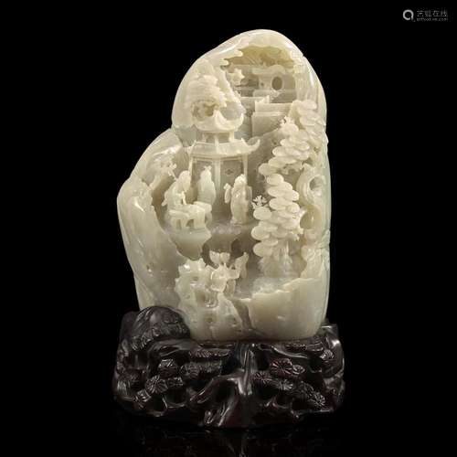 A Chinese carved greyish-white jade "Mountain" and...