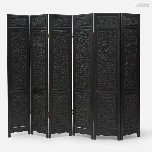 A Chinese carved hardwood six-panel “Dragons” screen 硬木浮雕...