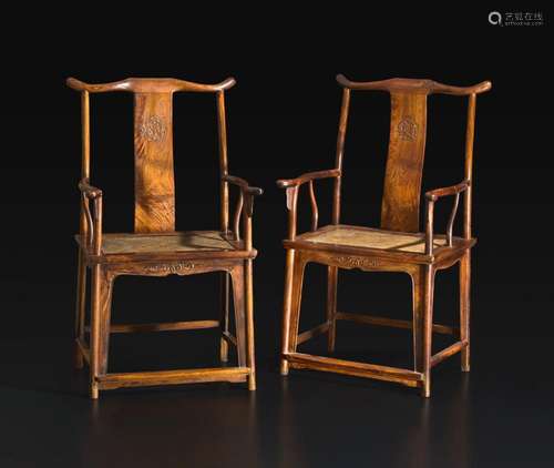 A rare pair of Chinese Huanghuali yoke-back armchairs, sichu...